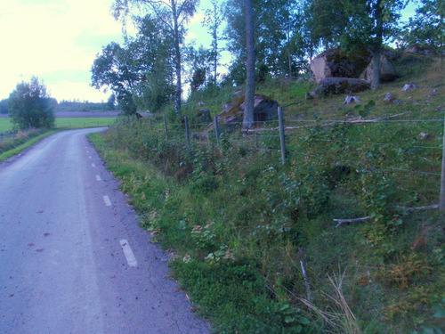 Cool rocks bend a road.